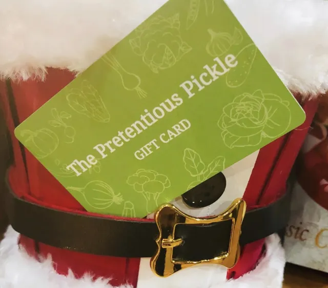 A Pretentious Pickle gift card tucked into a Santa belt